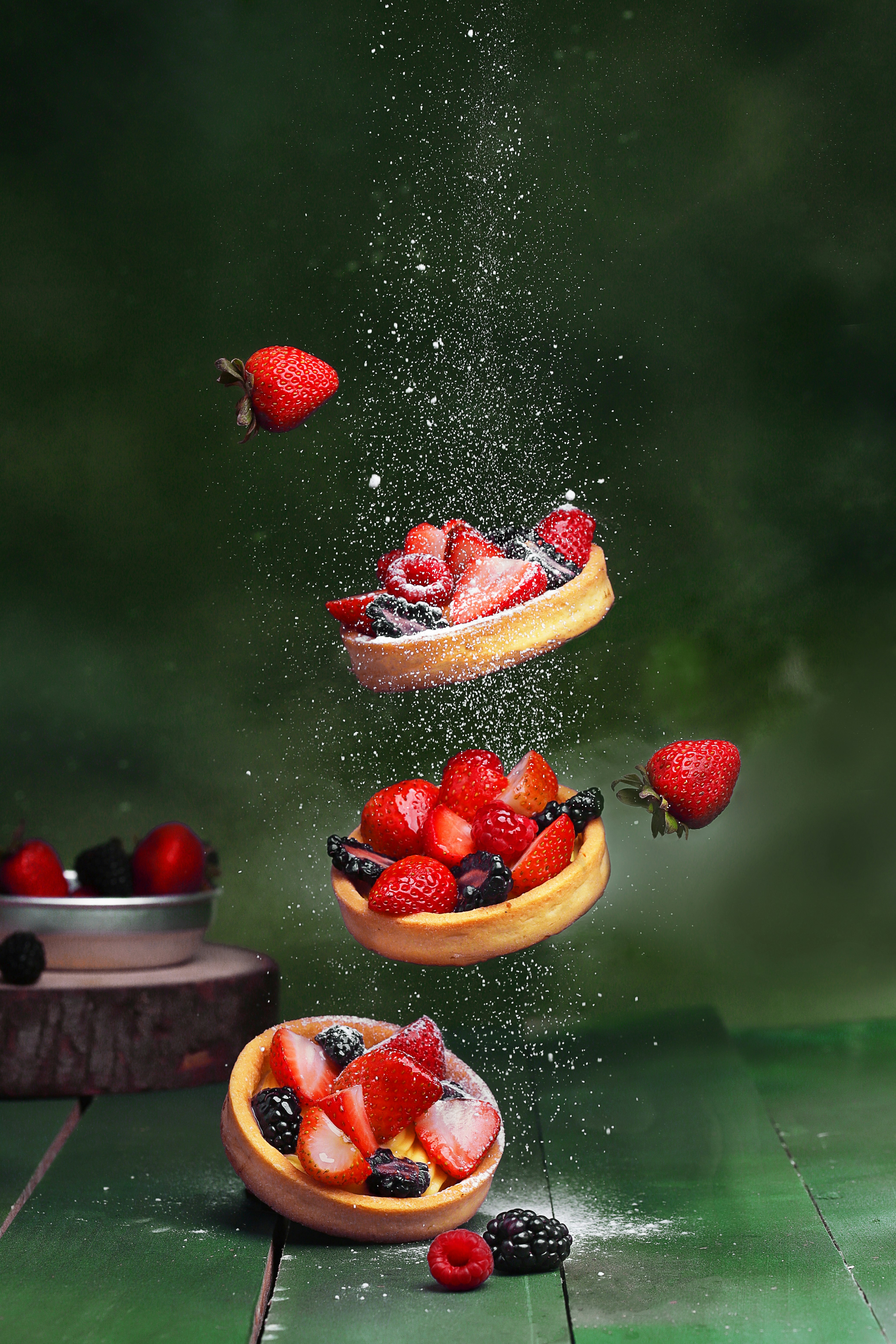 strawberries on brown wooden bowl